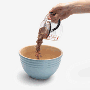 4-in-1 Adjustable Measuring Cup with Built-in Scraper